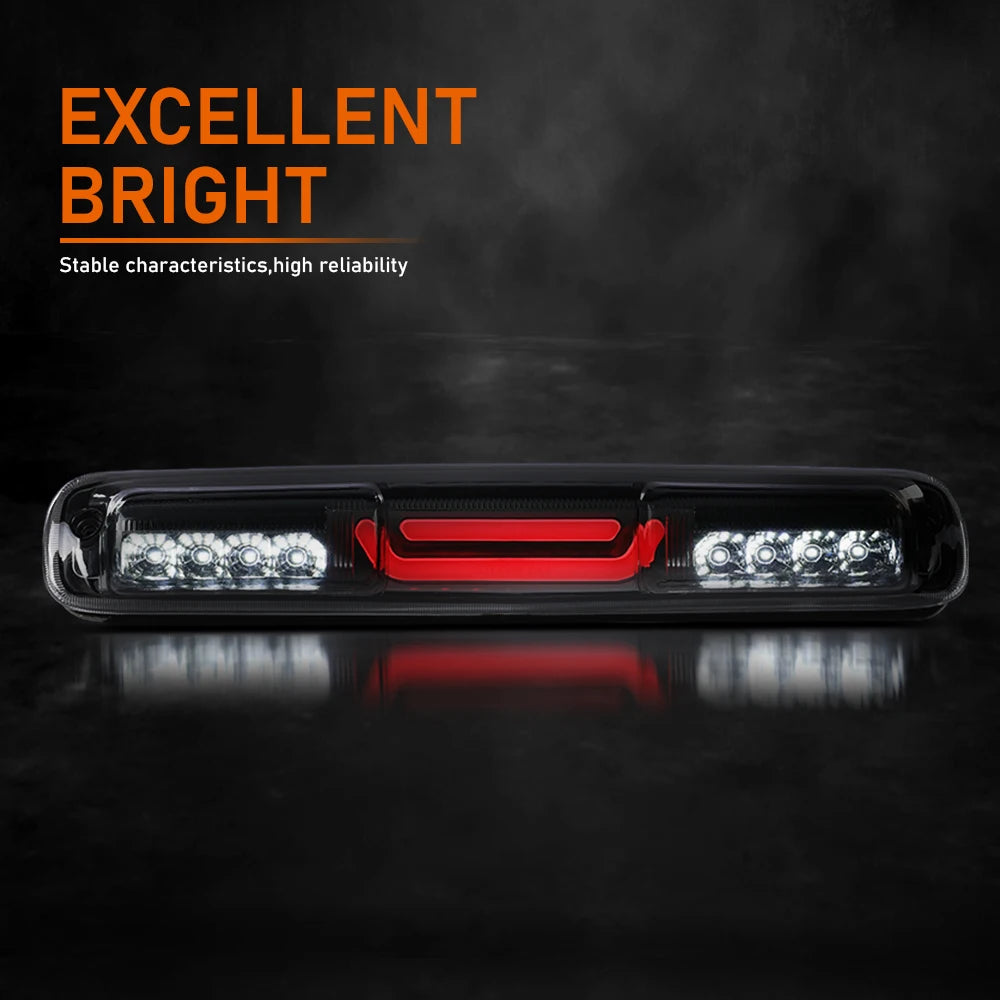 A close-up view of an LED high-mount third brake light assembly with a red accent on a dark surface.