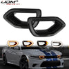 Black switchback LED grill lights installed on a white Dodge Charger.
