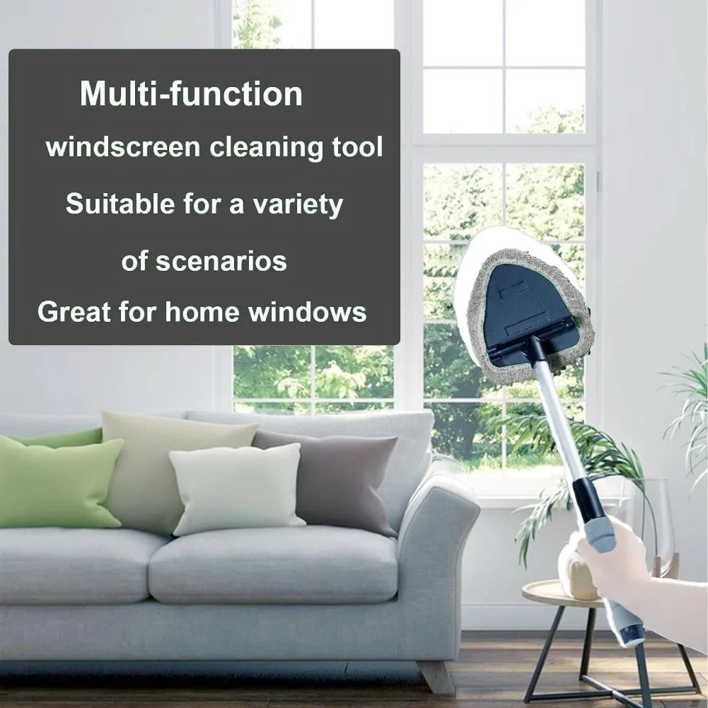 An extendable windshield cleaning tool with a microfiber pad is shown next to a window and a sofa.
