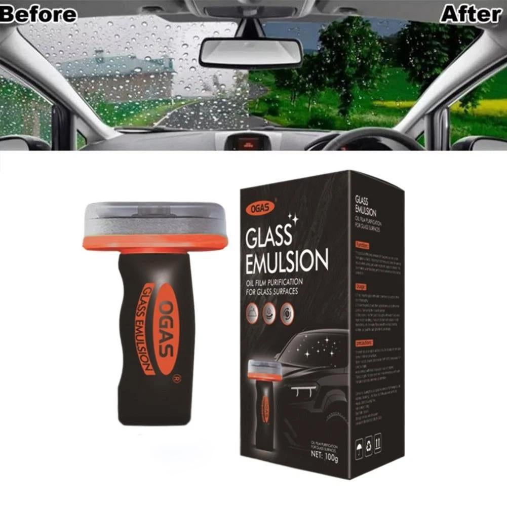 A black bottle of OGAS Glass Emulsion oil film remover next to a box and a car interior view.