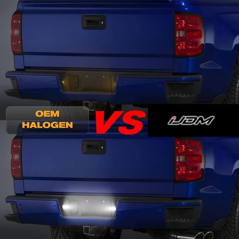 Comparison of OEM halogen and JDM style license plate lights on a blue truck tailgate.
