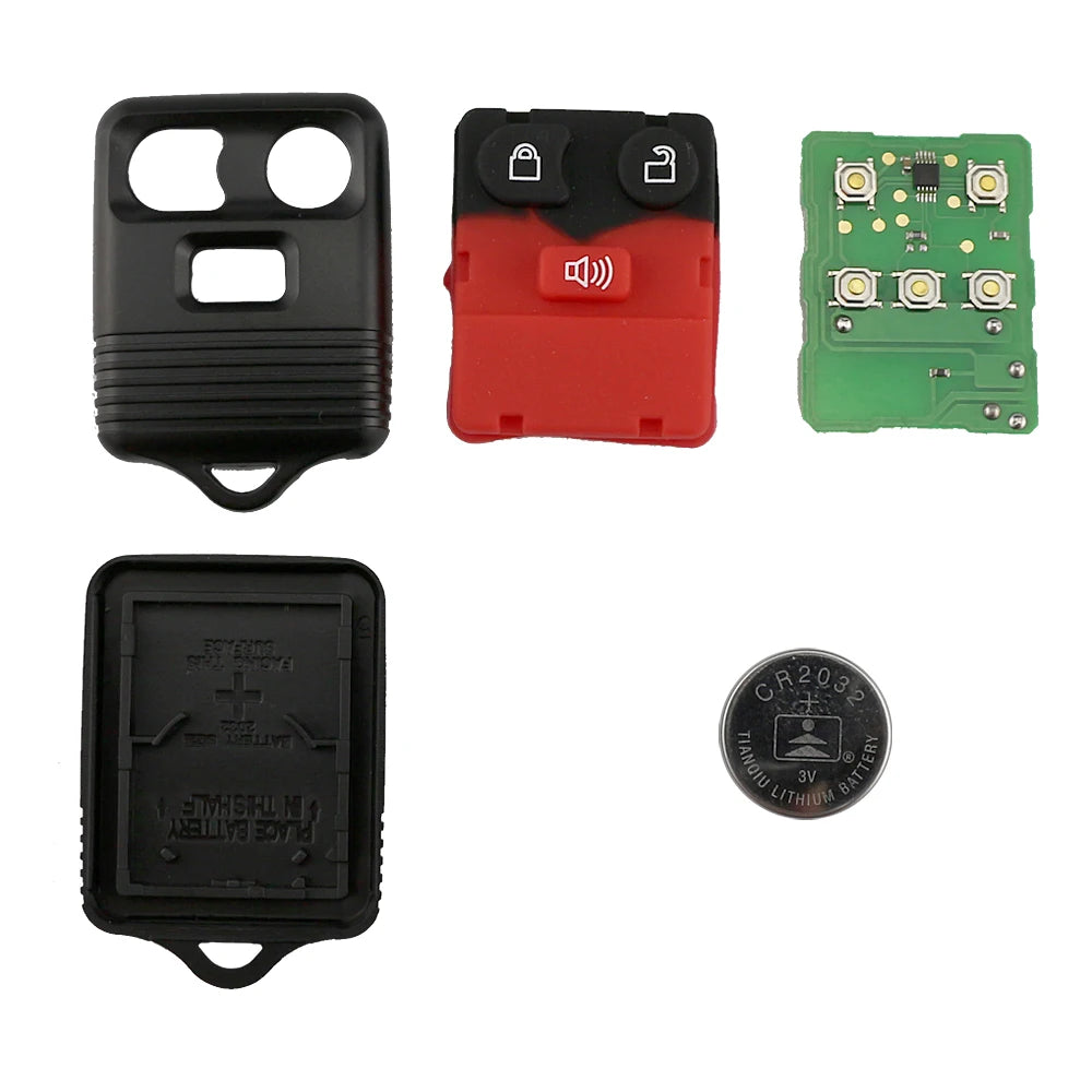 A set of universal remote car keys including a black remote, a red key fob, and a black battery.