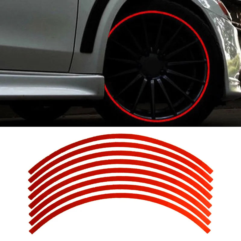 Red reflective rim tape decals applied to a black car wheel.