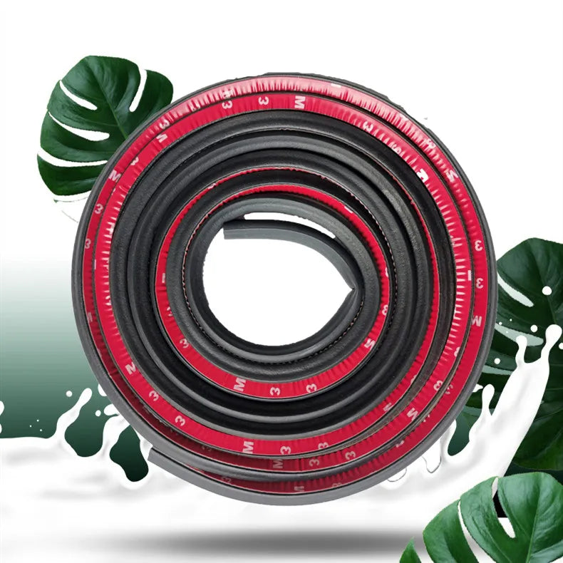 A roll of black rubber door seal strips with red accents shown against a green leaf background.