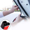 A hand is installing a black rubber seal strip into the door frame of a car, demonstrating universal car door rubber seal str