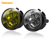 A pair of round halogen fog light kits for a vehicle, showing the clear and yellow lens components.