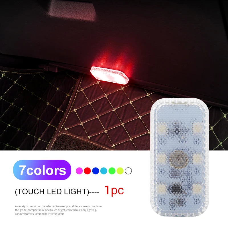 A white mini wireless LED touch light is mounted on a dark interior surface, illuminating the surrounding fabric.