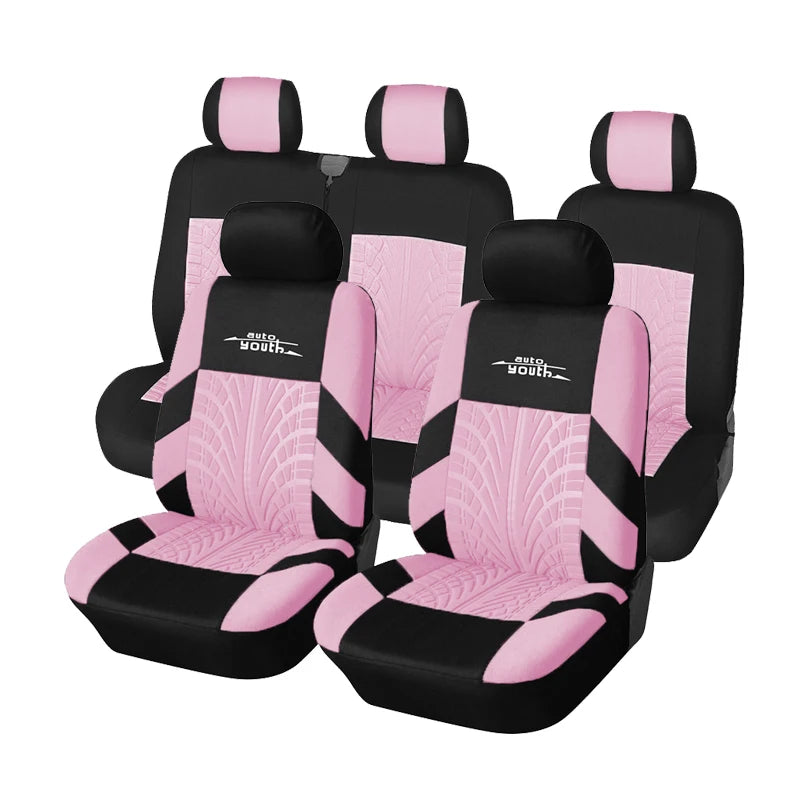 A set of black and pink universal car seat covers for double front and 2+1 seating.