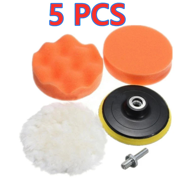 A set of five orange polishing sponges, a black disc, and a metal screw for car detailing.
