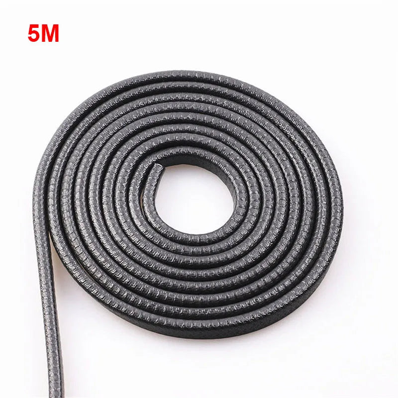 A roll of black car door edge protector trim, 5 meters long.