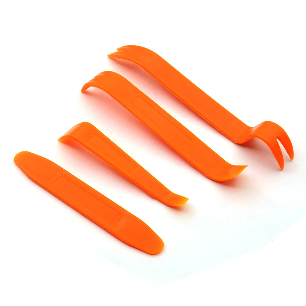 Orange car trim clip removal pliers shown against a white background.