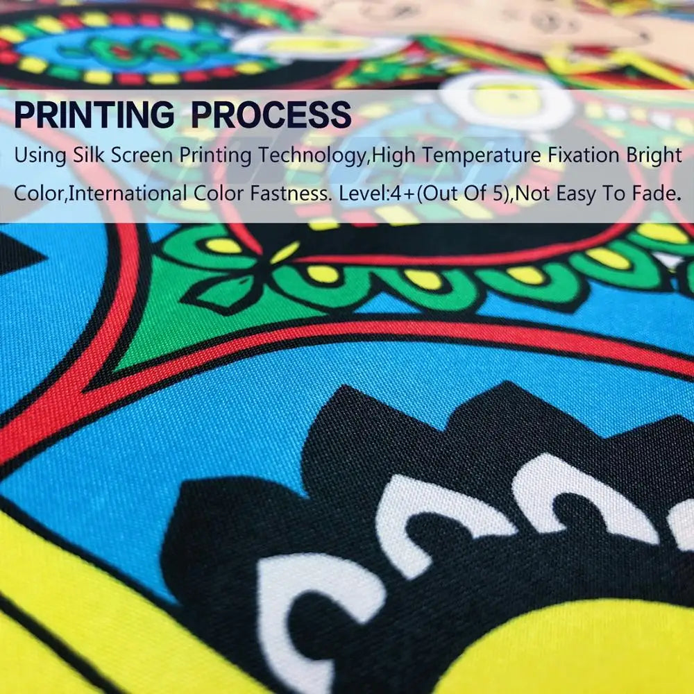 Close-up of a vibrant fabric design featuring Mexican flag elements on a hood cover.