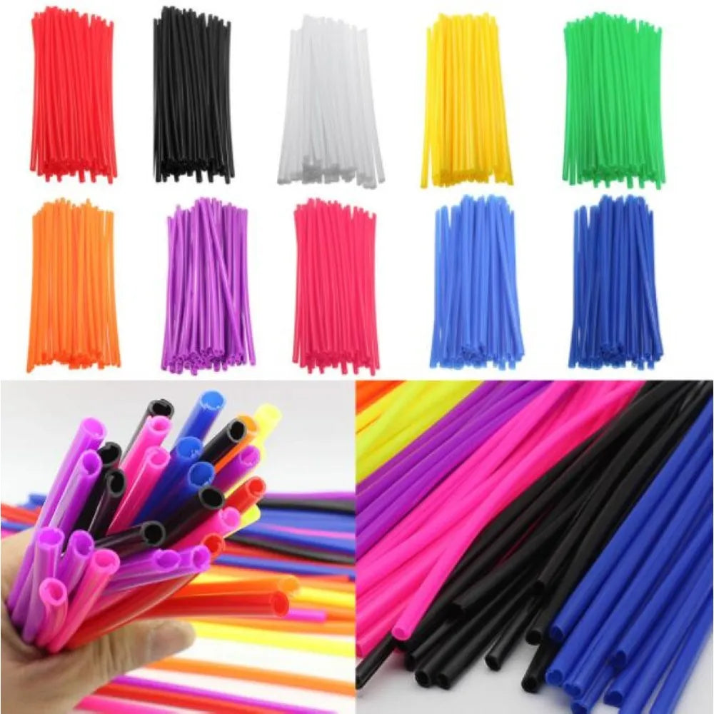 Assortment of colorful plastic spoke wrap kits and various colored plastic tubes.