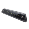 Black LED third brake light assembly for a Ford F-150 truck.