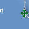 A collection of silver and green car pendants featuring various shapes like a clover, gear, heart, and animal figurine.
