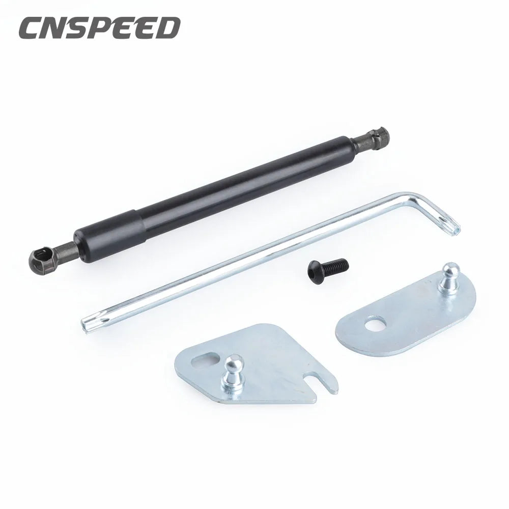 Hydraulic tailgate shock struts for Ford F-150 showing a black rod and silver mounting plate.