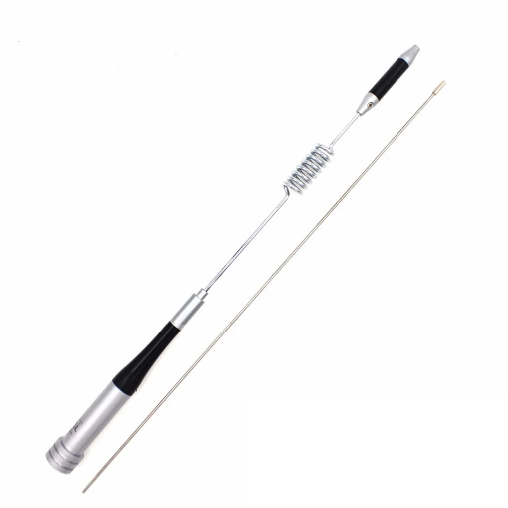 Antenne mobile à double bande avec poignée noire et élément de fil enroulé.