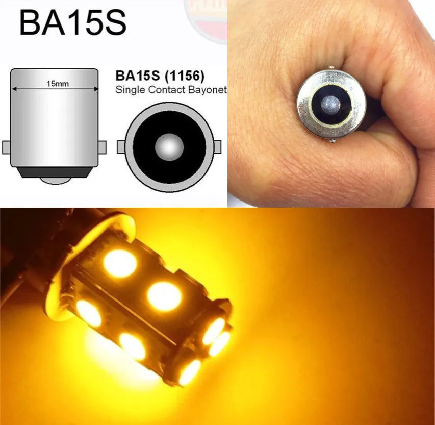 Primer plano de una bombilla de bayoneta de una sola bahía BA15S y un indicador LED iluminado.