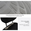 Close-up of a tire tread pattern and a black headrest cover designed for removable use.