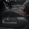 A close-up view of a black faux leather car seat cover, showing the adjustment mechanism for an automatic seat function.