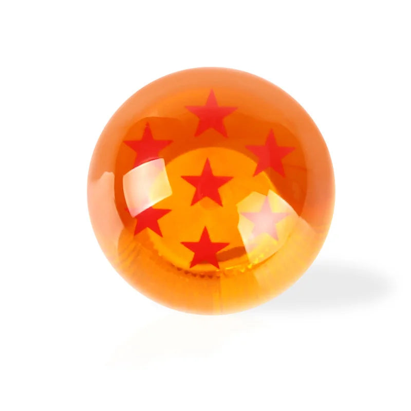 Maneta de cambios redonda de color ámbar con detalles de estrella roja.