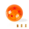 Maneta de palanca brillante naranja con estrellas rojas y una tuerca de latón.