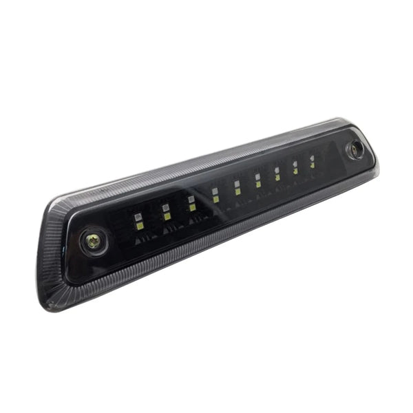 Black LED third brake light assembly for a Ford F-150 truck.