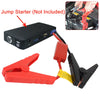 A red and black jump starter cable with a clamp is shown next to a black battery pack.
