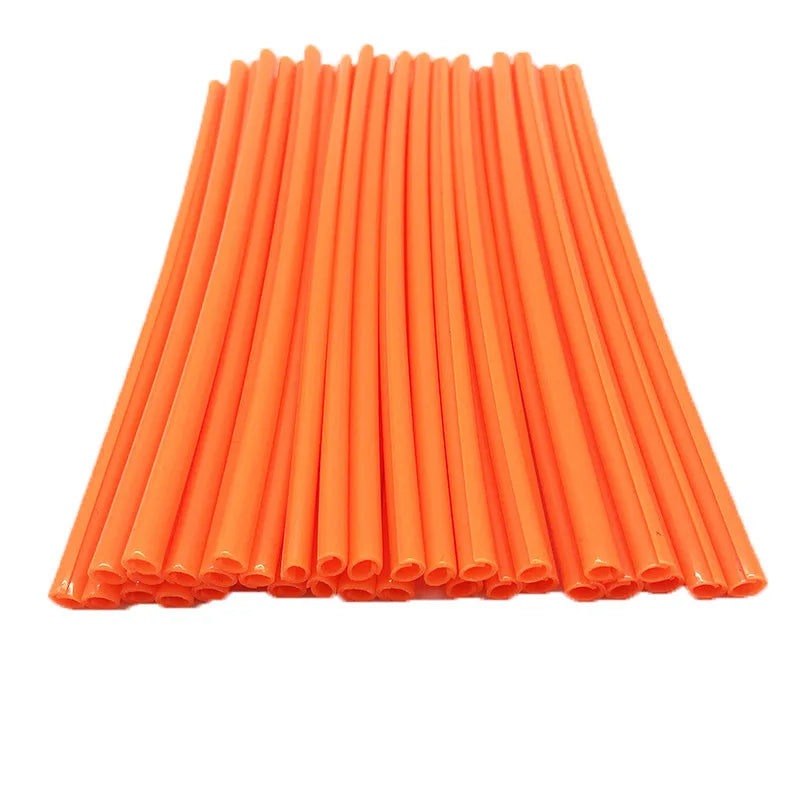 A bundle of bright orange motorcycle wheel rim spoke wrap tubes.