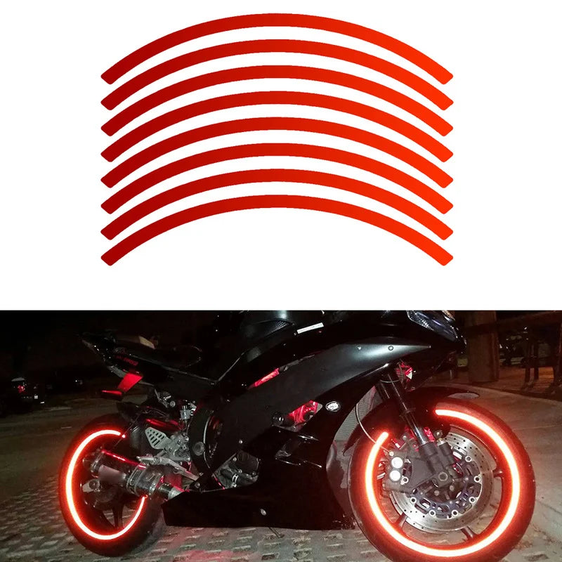 A black motorcycle with bright red reflective rim tape decals on the wheels.