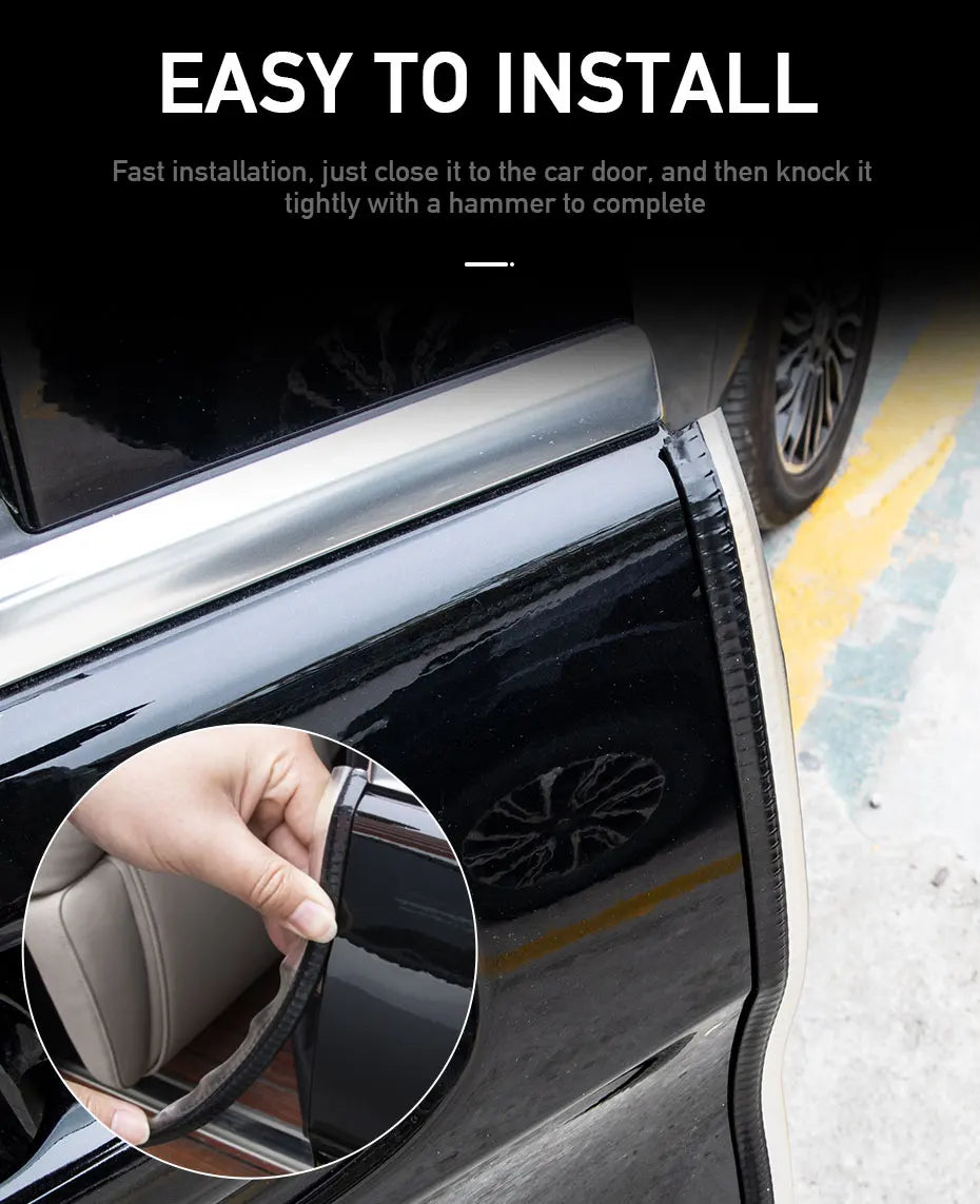 Close-up of a hand installing a black door protection strip on a car door panel.
