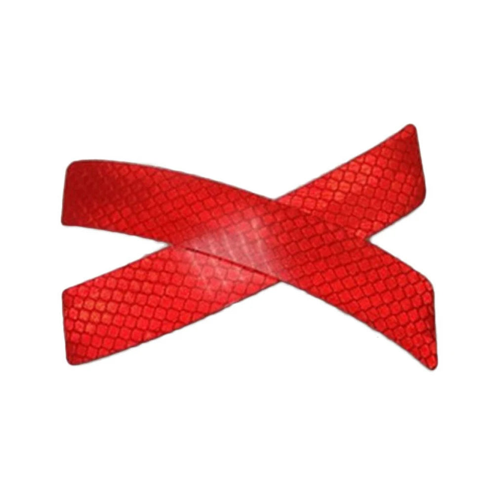 Red reflective tape shaped like an 'X' for a car bumper warning strip