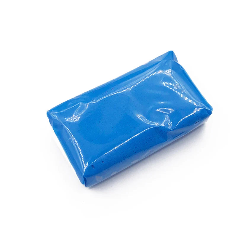 A blue Magic Clay Bar for auto detailing is shown in a rectangular package.