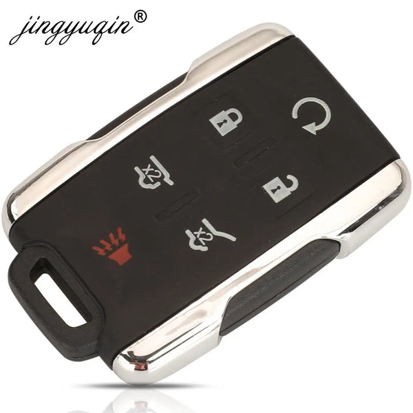 A black key shell replacement with silver accents and various key-like symbols for Chevy/GMC vehicles.