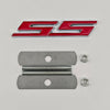 A red and silver SS emblem badge and two metal mounting plates for Chevrolet vehicles.