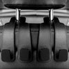 Close-up view of black car headrest hooks designed for bag organization.