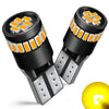 A close-up view of Canbus Error-Free T10 LED bulbs with orange and white lenses and silver bases.