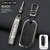 A black shell and key chain featuring a durable zinc alloy key fob cover for Kia vehicles with a 5-button design.