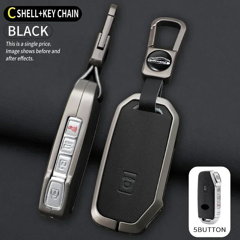 A black shell and key chain featuring a durable zinc alloy key fob cover for Kia vehicles with a 5-button design.