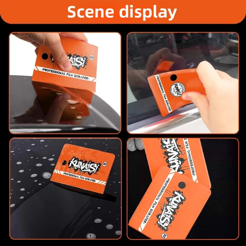 Orange professional film scraper tool with a silicone blade being used on a surface.