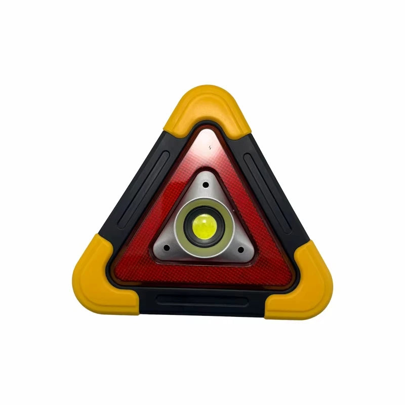 A triangular solar emergency warning light with a yellow bezel and red lens.