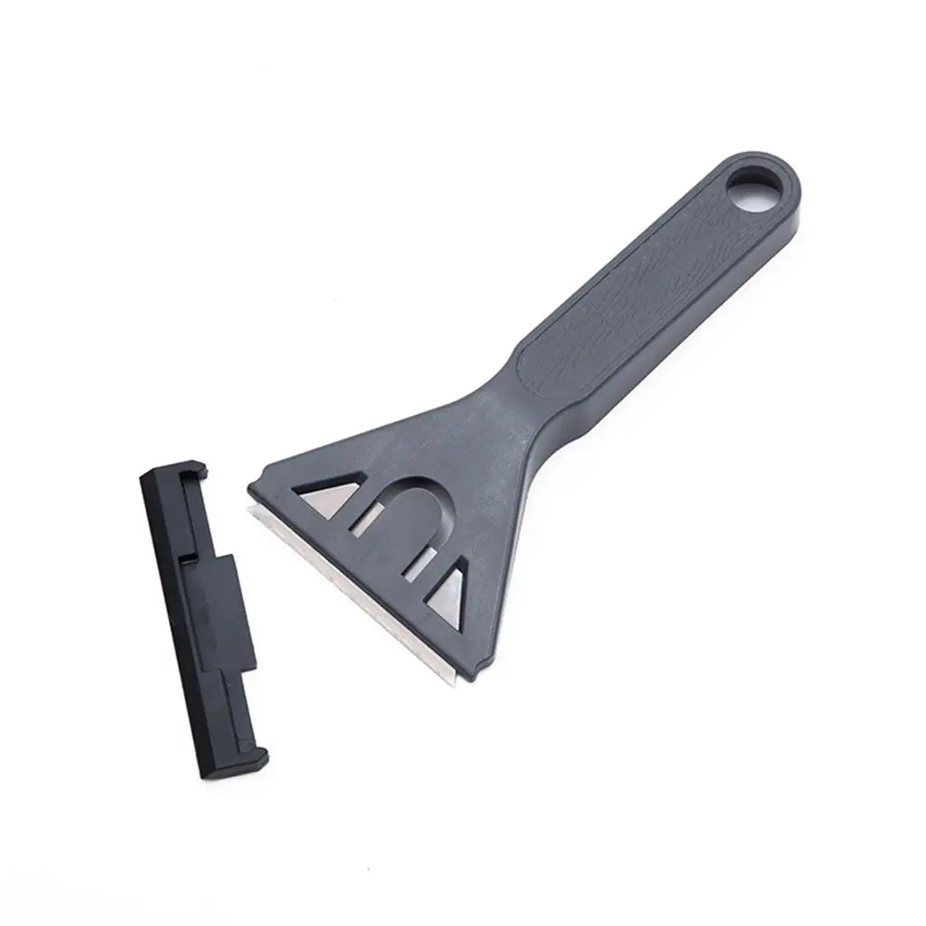 A gray versatile razor scraper tool with a handle and blade for cleaning glass, tile, and various surfaces.