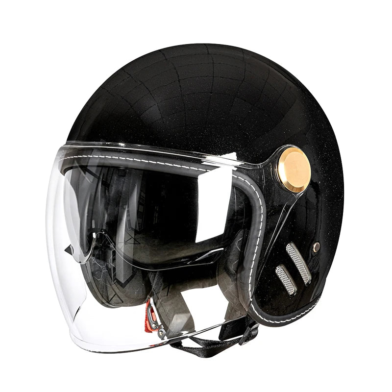 A black retro motorcycle helmet with a clear visor and leather accents.