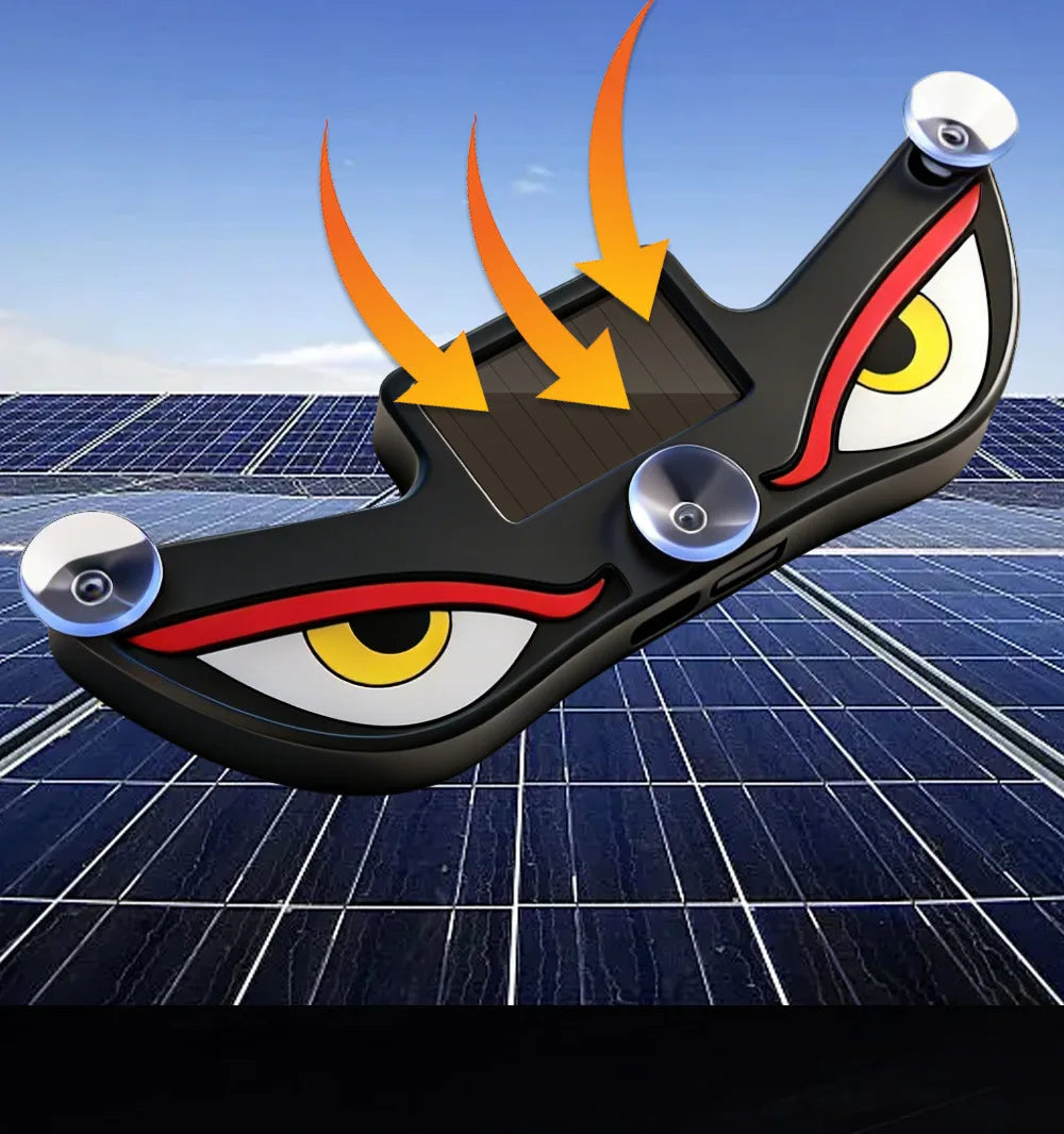Una luz LED dinámica en forma de ojo, negra, proyecta un haz sobre una superficie de panel solar.