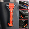 An orange heavy-duty emergency window breaker and seatbelt cutter tool is shown inserted into a car interior panel.
