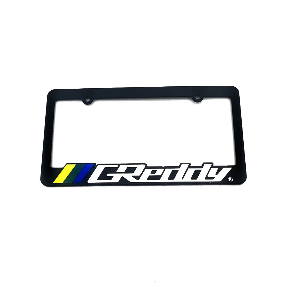 Black license plate frame decoration with the word Reddy in white and yellow text.
