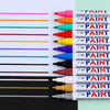 A collection of various colored paint marker pens arranged in a row against a light green background.