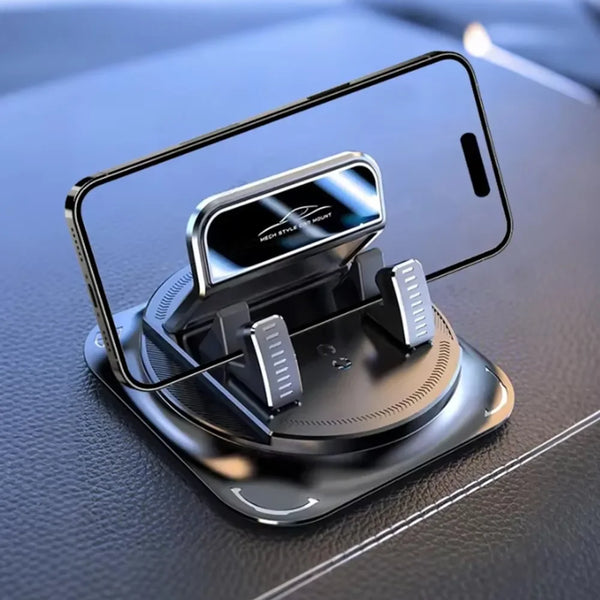 A black 360° rotating anti-slip car dashboard phone mount with a clear holder is shown on a dark surface.