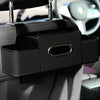 A black multifunctional car back seat organizer with a cup holder mounted on the seat.