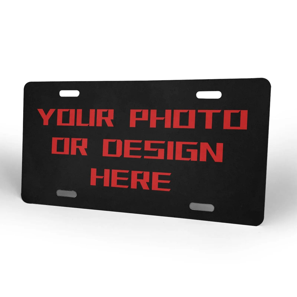 A black license plate with red text that reads YOUR PHOTO OR DESIGN HERE